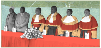 Four Judges from Ghana and two officials standing at a table